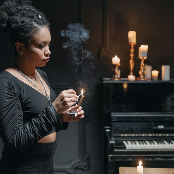 Top view of person practicing mindfulness in a dark futuristic room